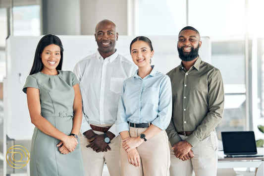 Confident business team standing together in workplace – Advancing ACTIVE© LEADER 8-Part Coaching Programme