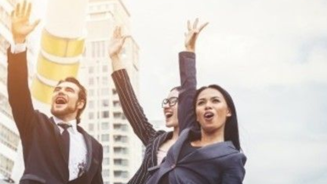 Group of people excited with hands in the air, ACTIVE_LeaderDiversity
