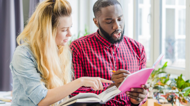 Two colleagues collaborating during the Ethics for ACTIVE© Leaders - Group Training (1 Day) workshop.
