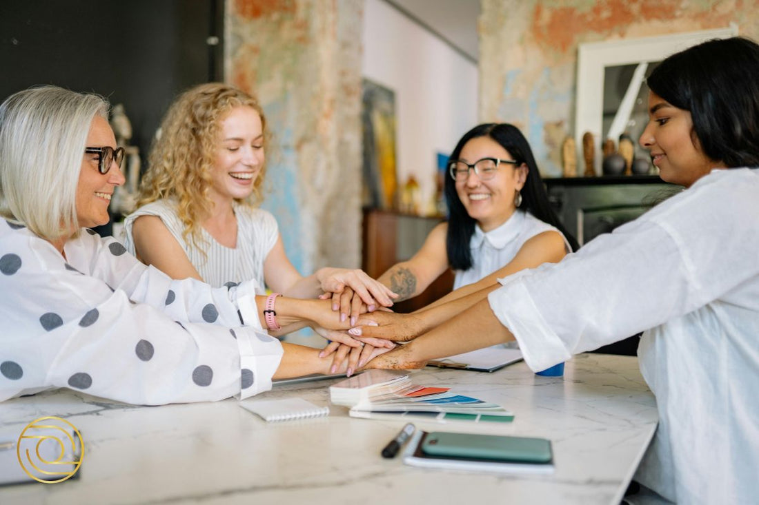 How ACTIVE© Leaders Contribute Through Others – Peas in a Pod: Women connecting hands during leadership training session