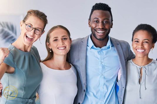 Corporate team smiling in confidence – Step Into Your Power Level 1. ACTIVE© Leader Coaching by Peas in a Pod