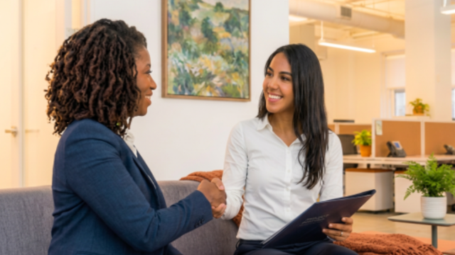Two women talking and smiling at the ACTIVE© Data Analysis for Systemic Decision Making - Group Training (5 x half days).
