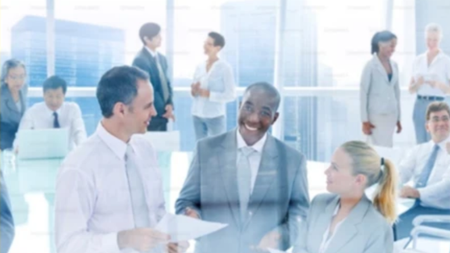 Diverse group of people talking to each other in groups